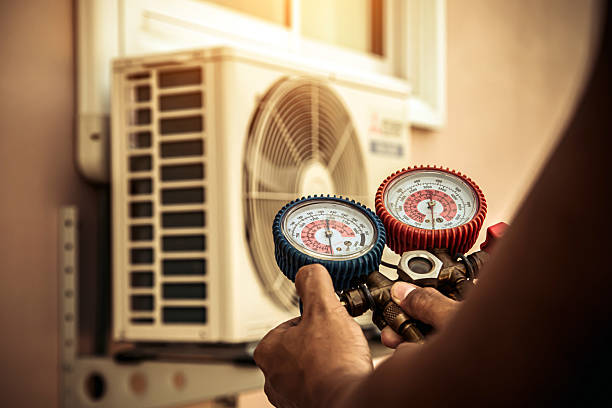 Professional Heat Pump Repair technician working in Towanda, IL